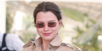 Thai actress Rebecca Patricia Armstrong was seen wearing gold Miu Miu MU B50S 5AK20I sunglasses with light brown lenses at Hotel Martinez, during Cannes Film Festival 2026.