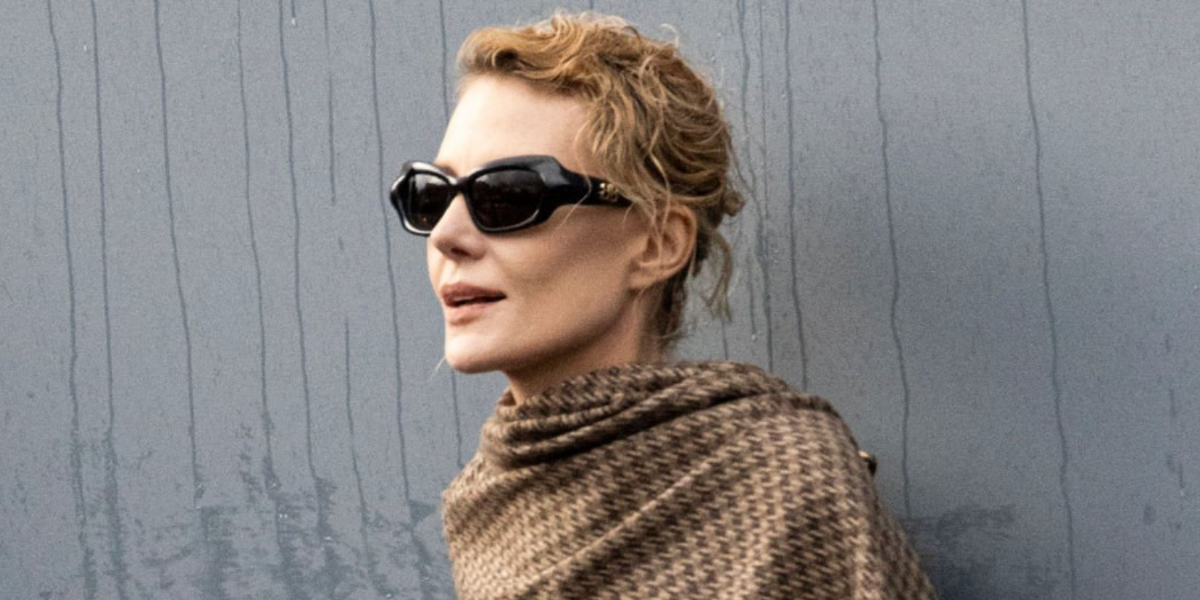 Russian actress Renata Litvinova was seen wearing black Balenciaga BB0354S 001 sunglasses at the Balenciaga Spring/Summer 2025 fashion show during Paris Fashion Week