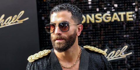 Internet personality Reza Jackson was seen wearing black and gold Dita Flight .006 7806 B sunglasses at the Los Angeles premiere of Michael Jackson's biopic "Michael" in April 2026.