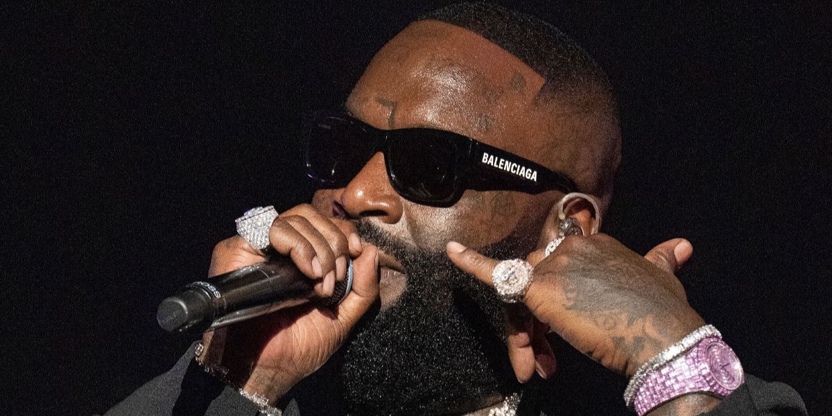 Rapper Rick Ross was seen wearing black Balenciaga BB0262SA 001 square sunglasses while performing onstage at Rick Ross: Port Of Miami Orchestra Reunion Tour in Atlanta, Georgia, June 2026.