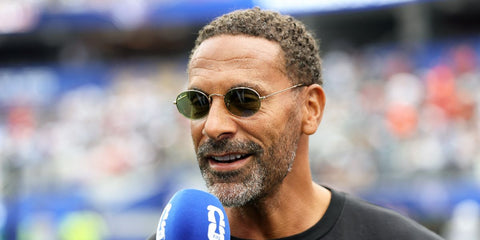 Former footballer Rio Ferdinand was seen wearing gold Ray-Ban Oval RB 3547 001/4E sunglasses with bottle green lenses at the FIFA World Cup 2026
