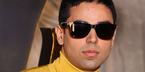 Actor Rish Shah was seen wearing black Saint Laurent SL 801 001 sunglasses at the Saint Laurent Fall/Winter 2026 fashion show during Paris Fashion Week.