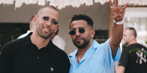 Riyad Mahrez, pictured right, was seen wearing gold Ray-Ban RB 3547N 001 oval sunglasses