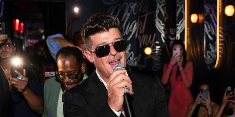 Robin Thicke is seen wearing Ray-Ban RB 3796 003/R5 sunglasses with silver frame while performing at Silver Lining Lounge in New York