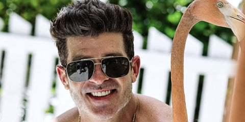 Robin Thicke is seen wearing Ray-Ban RB 3796 9196/S2 Polarised sunglasses in his Instagram post