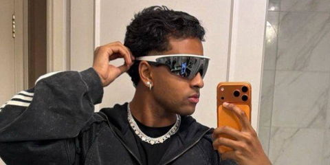 Brazilian footballer Rodrygo was seen wearing white Oakley Meta Vanguard OW8001 05 Smart Glasses with prizm black lenses.