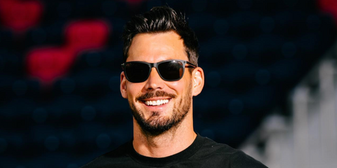 Swiss footballer Roman Burki was seen wearing matte black Tom Ford Alasdhair TF526 02A sunglasses in his Instagram post, May 2023.