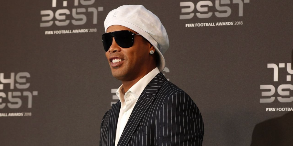 Brazilian former footballer Ronaldinho was seen wearing black Versace 2180 1000/87 sunglasses at The Best FIFA Football Awards 2018 in London. Shop online now on Pretavoir