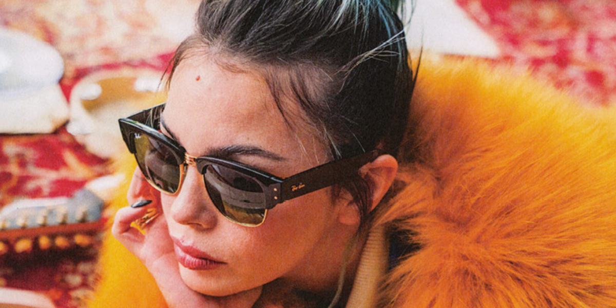 Rose Villain was seen wearing black and gold Ray-Ban Mega Clubmaster RB 0316S 901/31 sunglasses in a collaborative editorial with Ray-Ban and Interlude Project, 2023