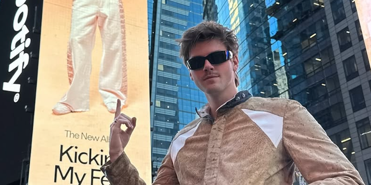Australian singer Ruel was seen wearing black Prada PR A14S 1AB5S0 wraparound sunglasses in his Instagram post, October 2025. Shop online now on Pretavoir