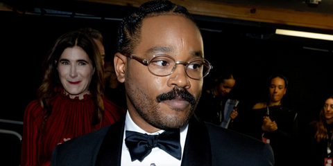Filmmaker Ryan Coogler was seen wearing silver Cartier CT0464O 003 oval optical glasses with brown wooden temples at the BAFTAs 2026. He won Best Original Screenplay for 2025 movie Sinners.