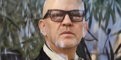 Ryan Murphy is seen wearing scraped grey Akoni Columba AKS 100E sunglasses in an interview with The New York Times