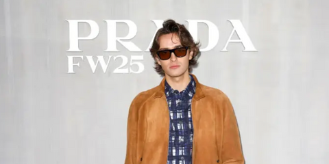 Ryan Prevedel was seen wearing Prada PR A17S 17N70F sunglasses with dark brown lenses to attend the brand's menswear Fall/Winter 2025 fashion show during Milan Fashion Week