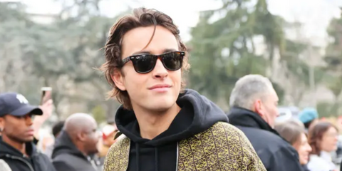 Ryan Prevedel was seen wearing tortoiseshell Ray-Ban Wayfarer 2140 902 sunglasses to attend Loewe Menswear Fall/Winter 2023 fashion show during Paris Men's Fashion Week