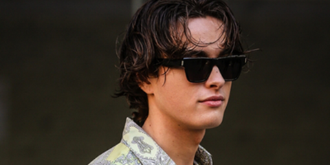 Ryan Prevedel was seen wearing Saint Laurent Sun SL 469 001 sunglasses to attend Etro Fall/Winter 2022 fashion show during Milan Men's Fashion Week