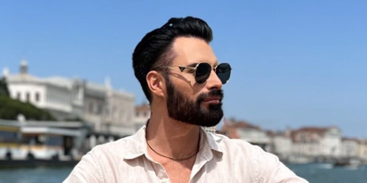 Rylan Clark was seen wearing silver Prada PR 57YS 1BC5D1 sunglasses with grey lenses in Venice