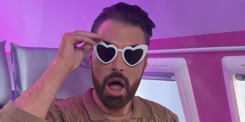 Rylan Clark was seen wearing ivory white heart-shaped Saint Laurent Sun SL 181 LouLou 003 sunglasses in his Instagram post