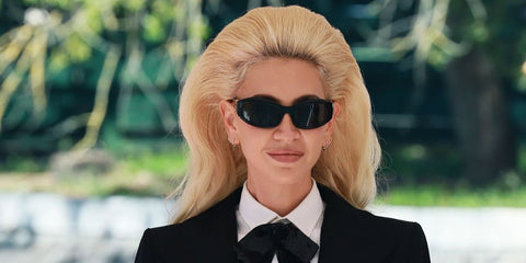 Jewellery designer Sabine Getty was seen wearing black Miu Miu MU 14ZS 16K08Z sunglasses at the Venice Film Festival 2025. Shop online now on Pretavoir