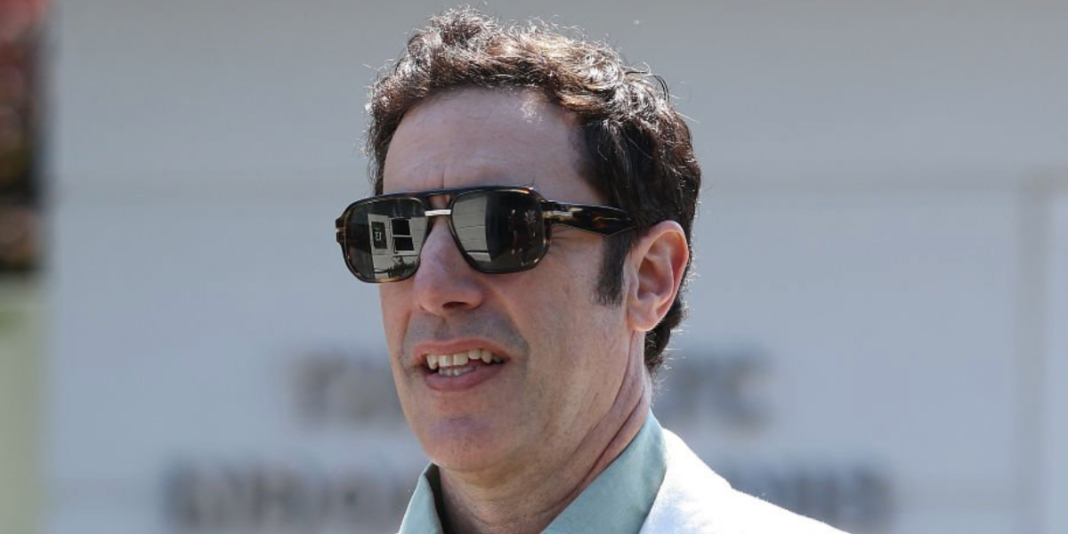 Sacha Baron Cohen was seen wearing grey tortoise Hugo Boss 1718/S KB78Z sunglasses at the Wimbledon Tennis Championships 2026.