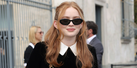 Sadie Sink was seen wearing black Prada PR 26ZS 16K08Z sunglasses at the Prada Spring/Summer 2026 fashion show during Milan Fashion Week. Shop online now on Pretavoir
