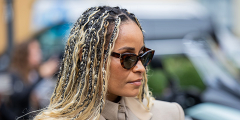 Sai De Silva of The Real Housewives of New York City was seen wearing tortoiseshell Saint Laurent Sun SL M115 003 sunglasses at the Sportmax Spring/Summer 2025 fashion show during Milan Fashion Week. Shop online now on Pretavoir