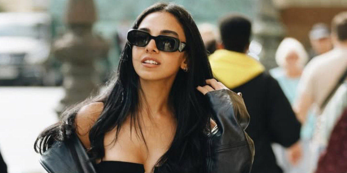 Egyptian actress Salma Abu Deif was seen wearing black Prada PR 17WS 1AB5S0 Symbole Sunglasses in her Instagram post, December 2023. Shop online now on Pretavoir