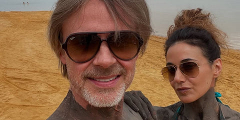 Actor Sam Trammell, pictured with partner Emmanuelle Chriqui, was seen wearing Ray-Ban Cats 5000 RB 4125 601/32 sunglasses