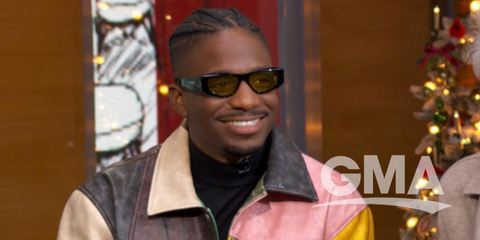 Emily in Paris actor Samuel Arnold was seen wearing black Prada PR B19S 16K455 sunglasses with yellow lenses in Good Morning America.