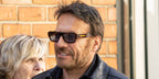 French actor Samuel Le Bihan was seen wearing tortoiseshell Ray-Ban Flacko RB 4454 1398/56 sunglasses with blue lenses at the Nadia Fares' funeral in April 2026.