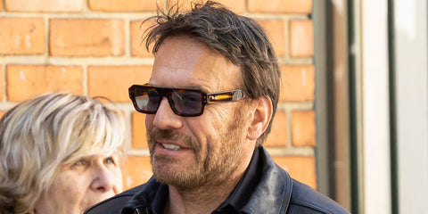 French actor Samuel Le Bihan was seen wearing tortoiseshell Ray-Ban Flacko RB 4454 1398/56 sunglasses with blue lenses at the Nadia Fares' funeral in April 2026.