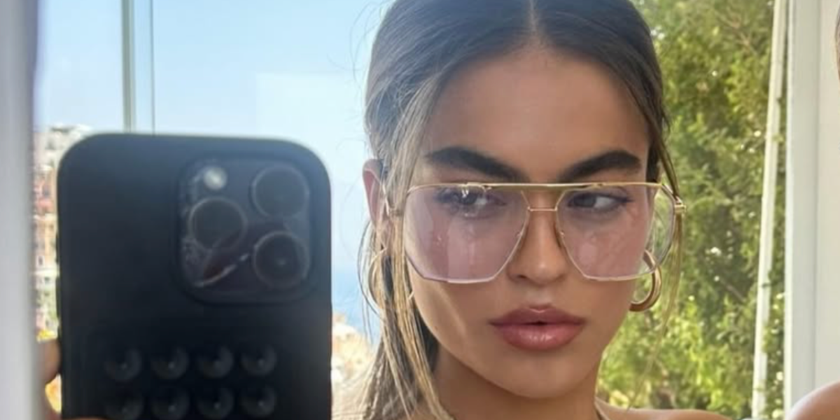 Television personality Sarah Jane Nader was seen wearing gold Bottega Veneta BV1012S 009 sunglasses with clear lenses in her Instagram post, February 2026.