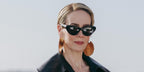 Sarah Paulson wore black Givenchy Bold GV40144U 01A cat eye sunglasses at the promo tour of All's Fair season 2 in Rome, October 2026.