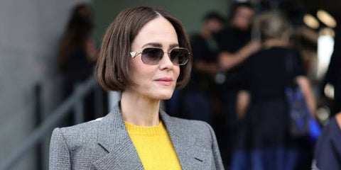 Sarah Paulson is seen wearing Prada PR A51S 1BC90A sunglasses to attend the brand's Spring/Summer 2025 fashion show in Milan