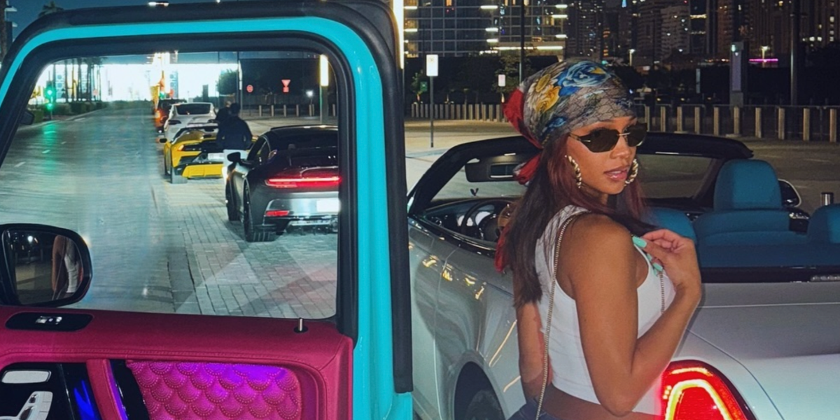 Saweetie was seen wearing gold Prada PR A56S 15N5S0 sunglasses in her Instagram post, December 2024