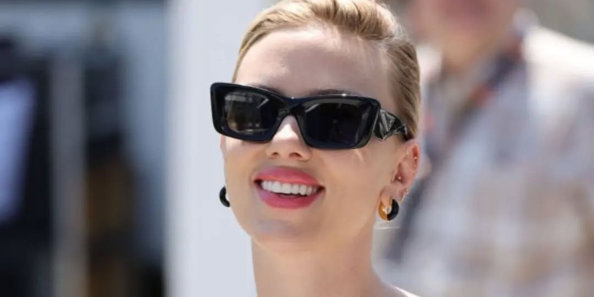 Scarlett Johansson was seen wearing black Prada PR 13ZS 1AB5S0 cat eye sunglasses to the 2023 Cannes Film Festival