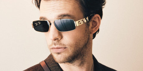 Actor Sebastiano Pigazzi was seen wearing gold Versace 2257 1002/87 rectangular sunglasses in a Vanity Twwn feature.