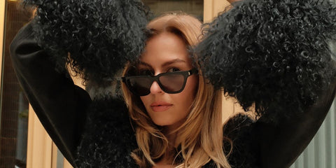 Entrepreneur and creator Serena Kerrigan was seen wearing black Saint Laurent Sun SL 462 Sulpice 001 sunglasses in her Facebook post, October 2025.