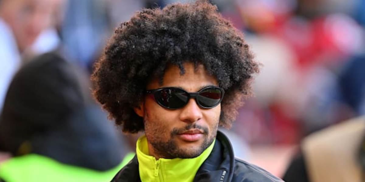 German footballer Serge Gnabry of Bayern Munich F.C. was seen wearing black Oakley Eye Jacket Redux OO9438 01 Prizm sunglasses.