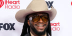 Celebrity and singer Shaboozey was seen wearing striped havana Tom Ford Bronson TF1044 56E sunglasses with yellow lenses at the iHeart Radio Music Awards 2026.