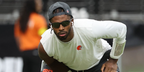American football quarterback Sheder Sanders of the Cleveland Browns was seen wearing black Oakley Flak 2.0 XL OO9188 72 Prizm Polarised sunglasses ahead of a game against the Las Vegas Raiders, November 2025.