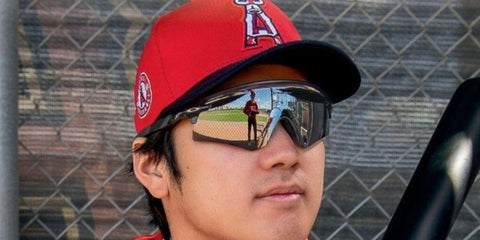 Shohei Ohtani wears Oakley Encoder OO9471 03 Prizm sunglasses while training