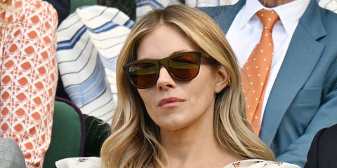 sienna Miller was seen wearing brown tortoiseshell Bottega Veneta BV1151SA 002 sunglasses at the Wimbledon Tennis Championships 2025. Shop online now on Pretavoir