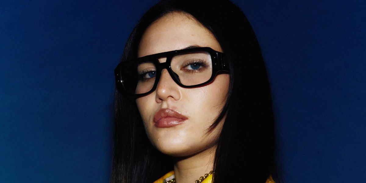Singer Sienna Spiro was seen wearing black Dolce&Gabbana DG3406 501 optical glasses in an NME feature, March 2025.