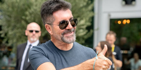 Simon Cowell is seen wearing Ray-Ban Aviator RB 3025 L2823 Black/Green sunglasses for a boyband audition in Dublin, July 2024