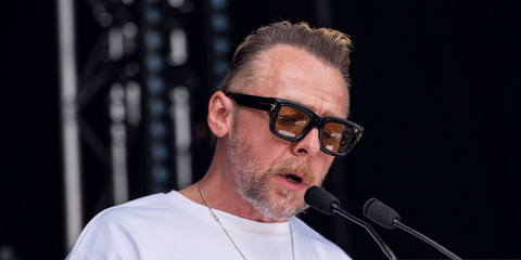 Simon Pegg was seen wearing black Tom Ford Ilias TF1154 01E sunglasses with yellow Photochromic during Letters Live with Greenpeace at the Glastonbury Festival 2025