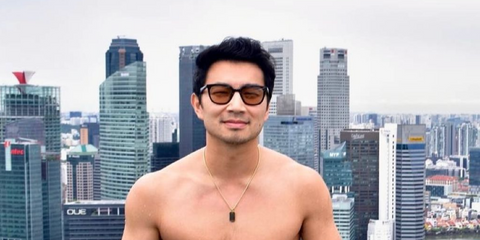 Simu Liu wears Gucci GG1582SK 004 Polarised sunglasses while vacationing in Singapore