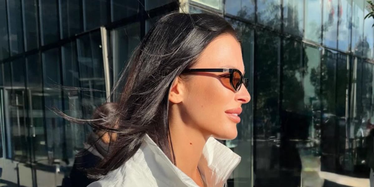 Russian actress and model Sofia Nikitchuk was seen wearing black Miu Miu MU A06S 16K10I sunglasses with brown lenses in Tbilisi, Georgia, shared through her Instagram post in February 2026.