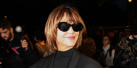 French actress Sophie Marceau was seen wearing black Balenciaga BB0324SK 002 sunglasses at the Balenciaga Spring/Summer 2025 fashion show during Paris Fashion Week.