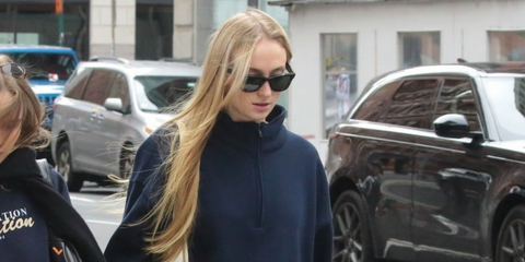 Sophie Turner was seen wearing black Ray-Ban Mega Wayfarer RB 0840S 901/31 sunglasses