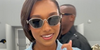 Sophie Wilde wears Loewe Anagram LW40115U 32V cat eye sunglasses to the brand's Spring/Summer 2024 fashion show in Paris